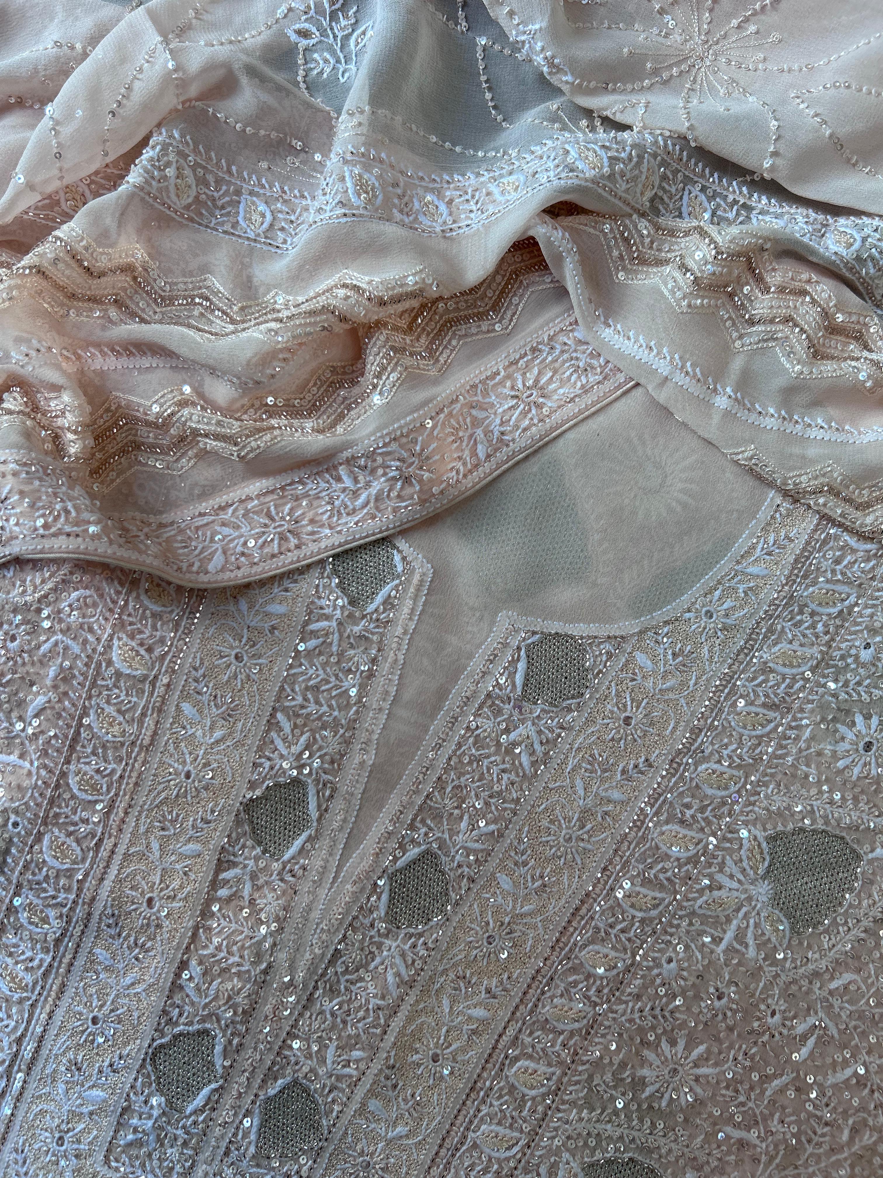 Peach georgette chikankari kurta set with statement jaal work