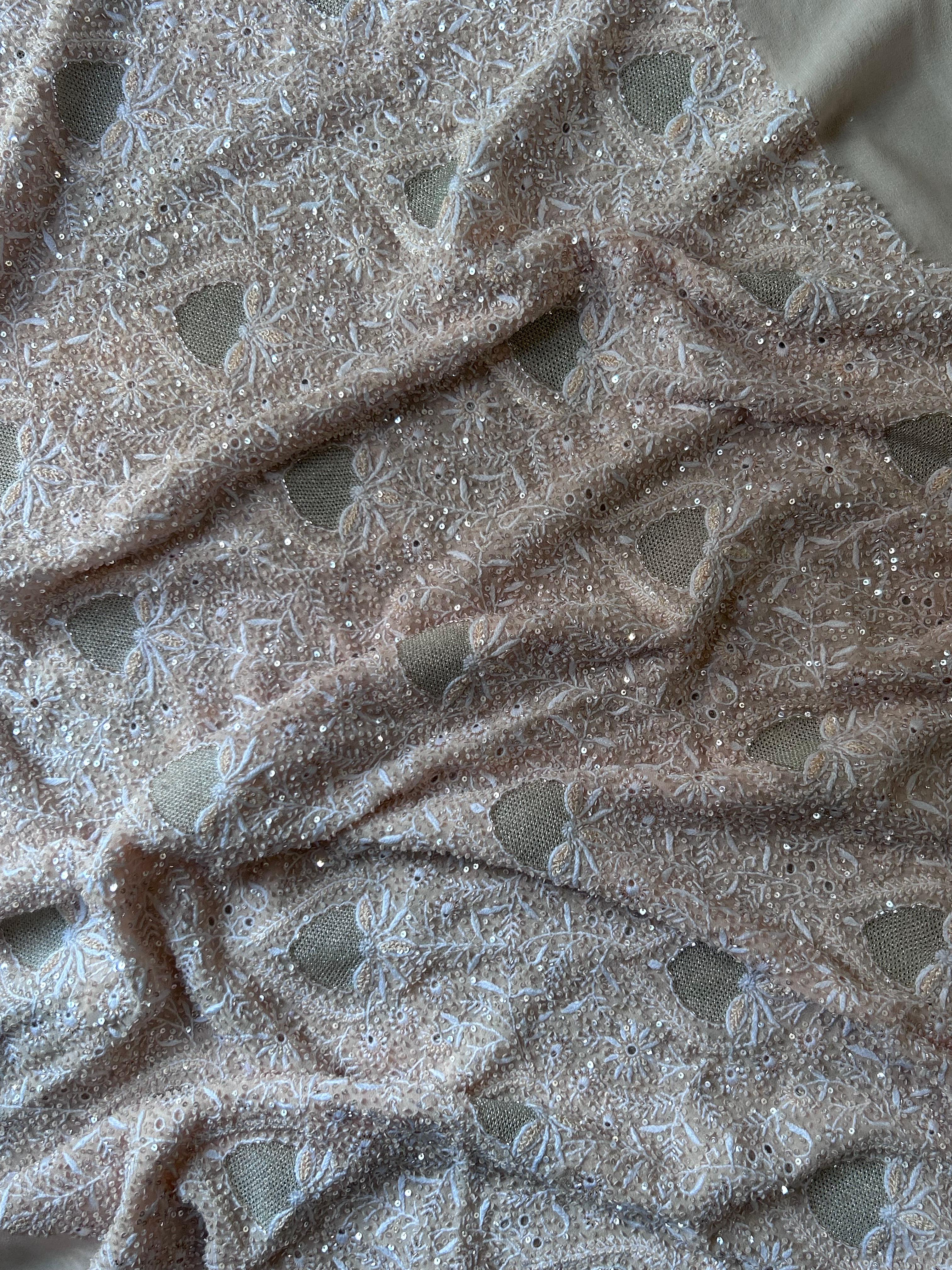 Peach georgette chikankari kurta set with statement jaal work