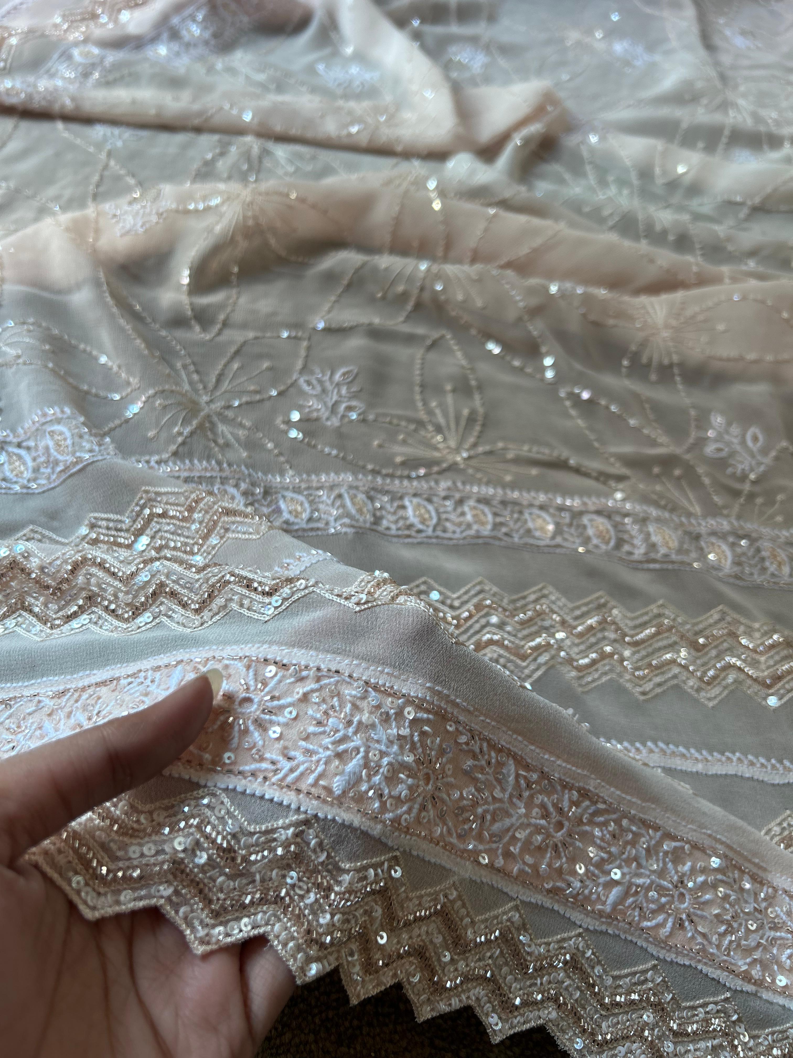 Peach georgette chikankari kurta set with statement jaal work