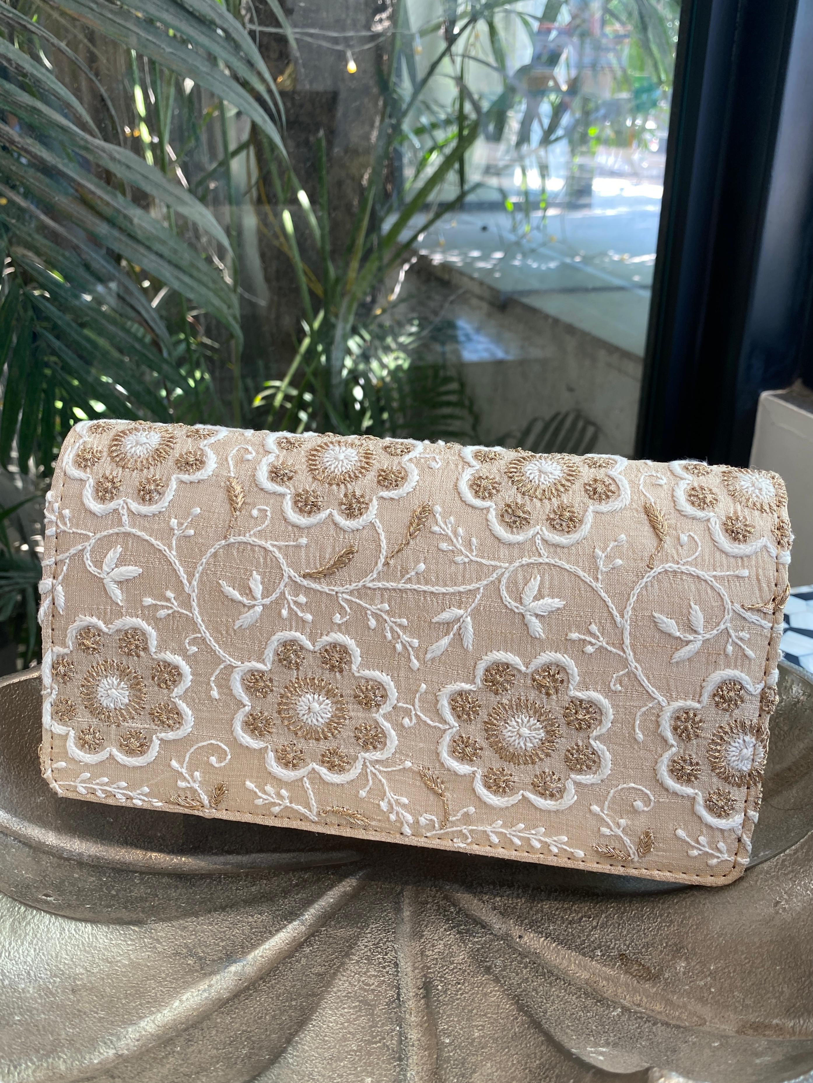 Beige silk clutch