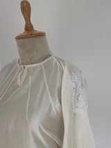 White chikankari shirt with cuffed sleeves