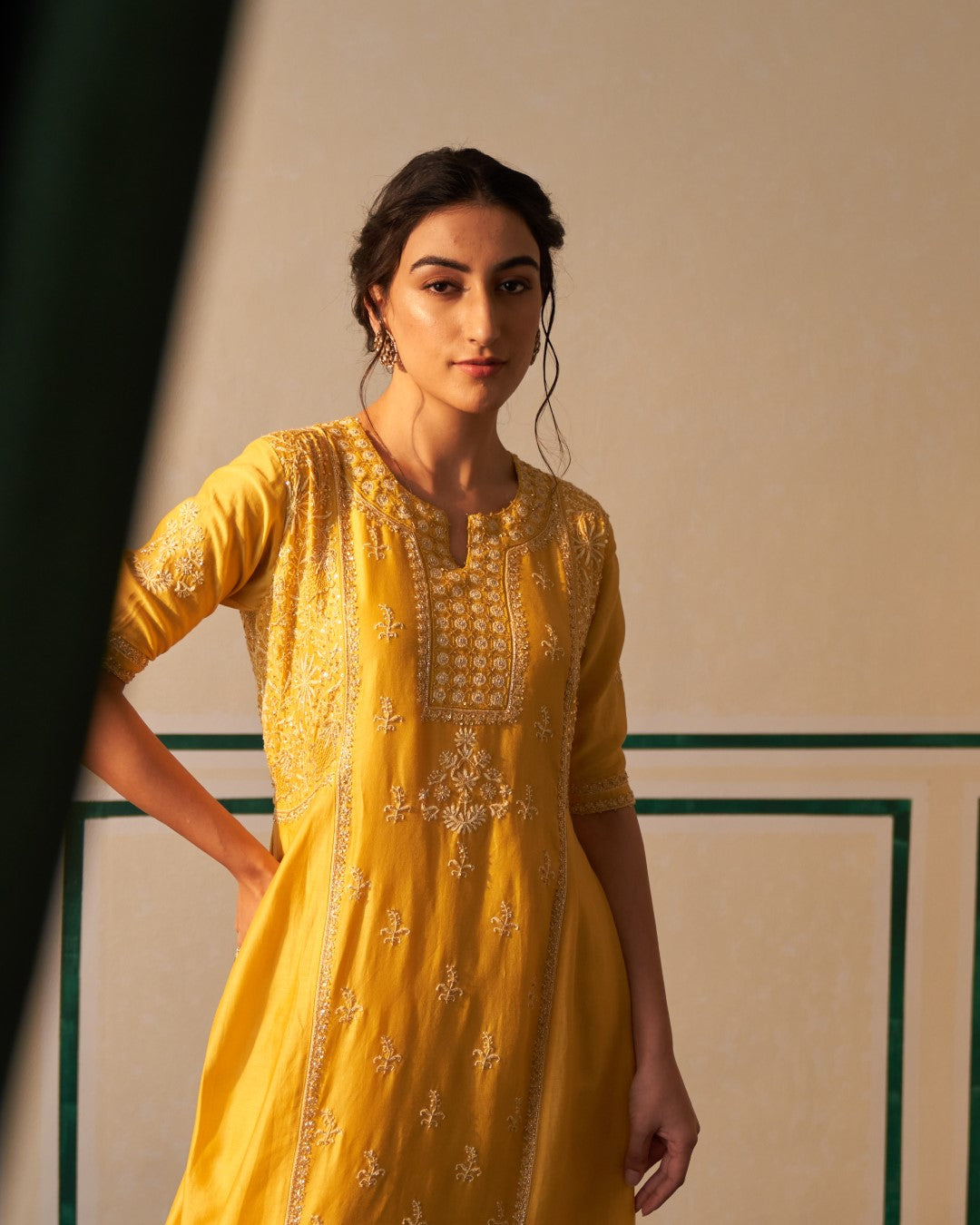 Mustard Chanderi Anarkali with heavy front and back work