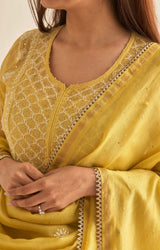 Yellow mul chanderi sharara set with mukaish and chikankari work