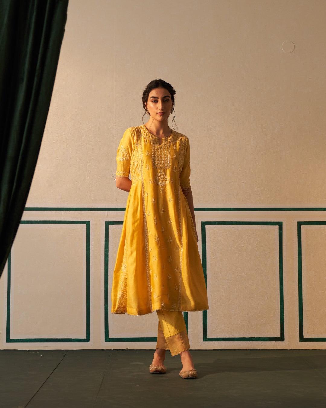 Mustard Chanderi Anarkali with heavy front and back work