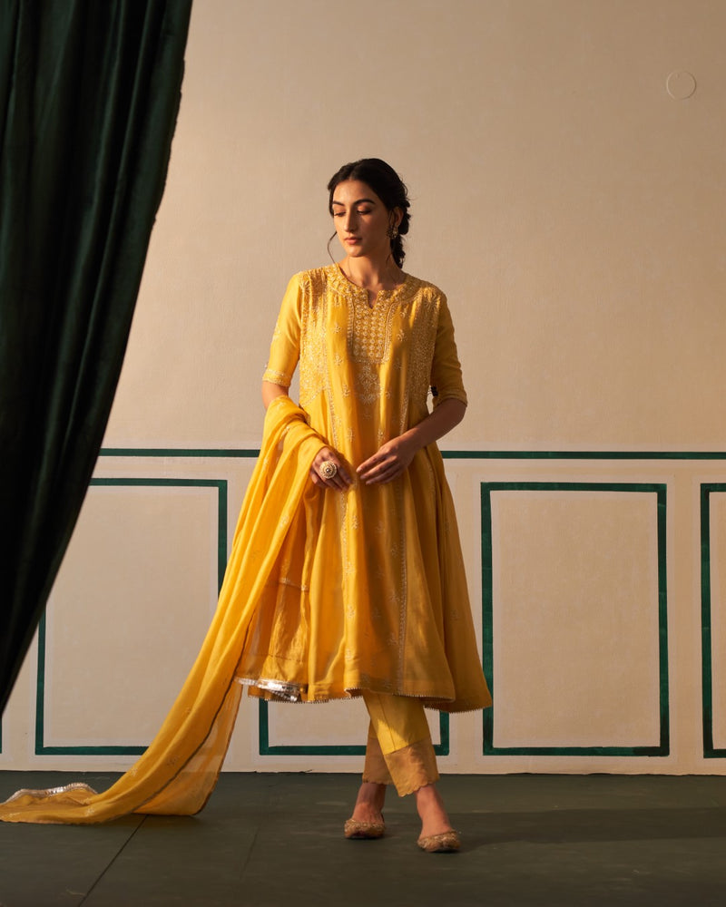 Mustard Chanderi Anarkali with heavy front and back work