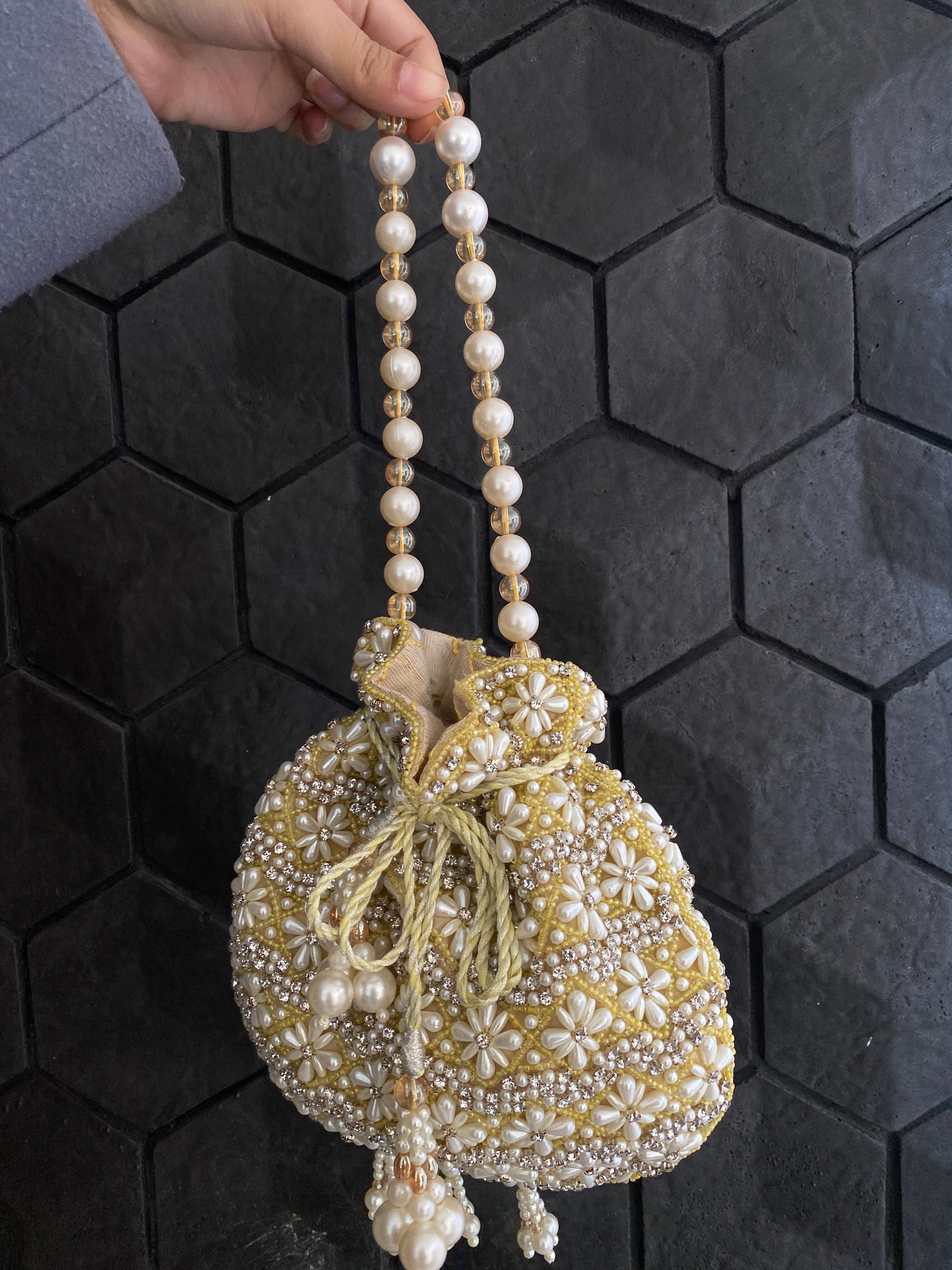 WHITE AND YELLOW PEARL EMBELLISHED POTLI BAG