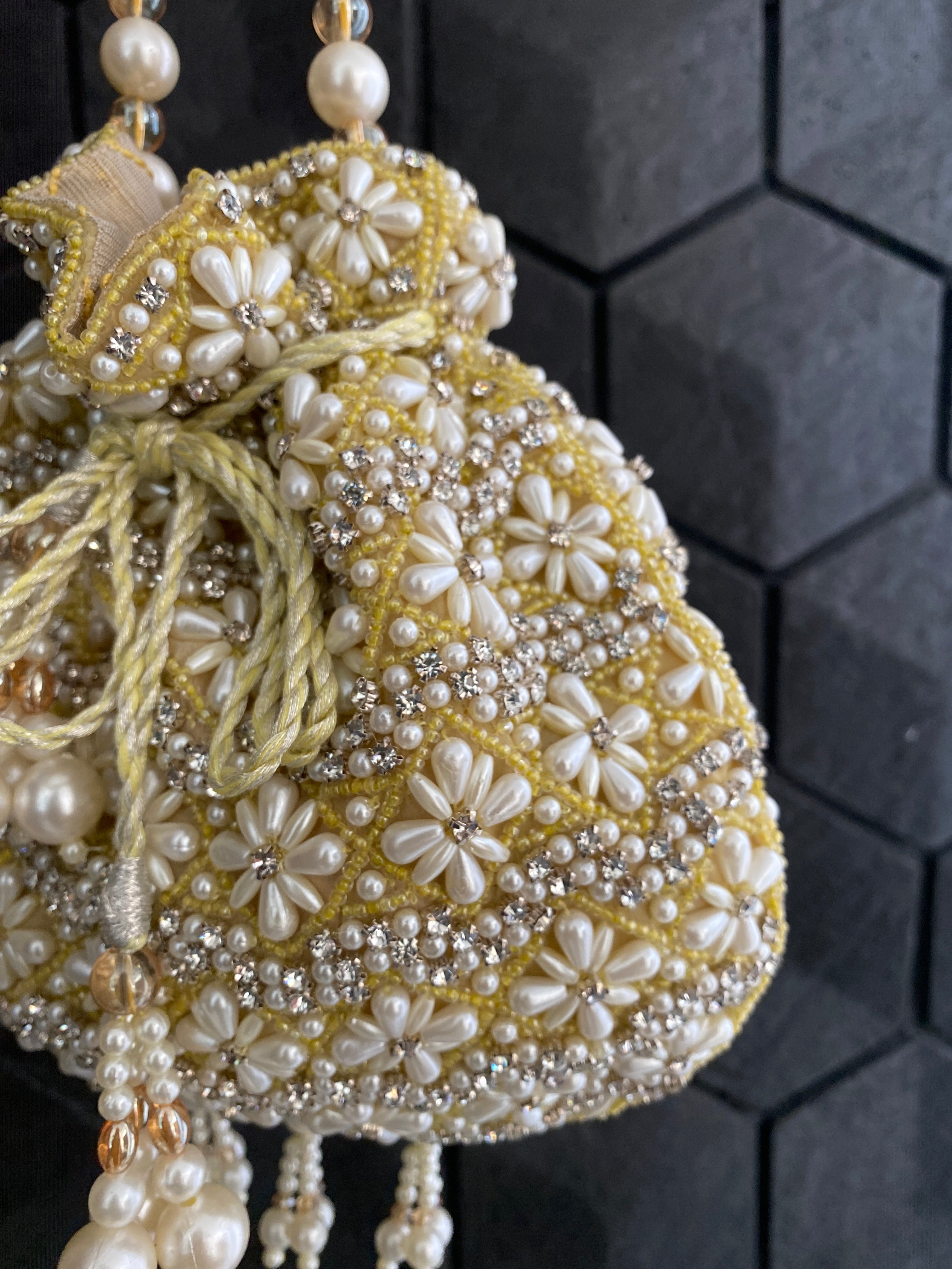 WHITE AND YELLOW PEARL EMBELLISHED POTLI BAG