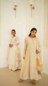 Gold tissue A-line kurta set with heavy sequins dupatta