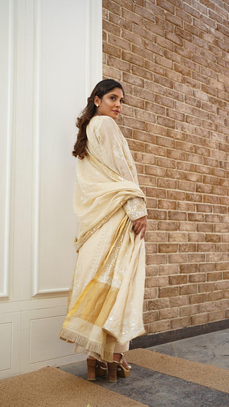 Gold tissue A-line kurta set with heavy sequins dupatta